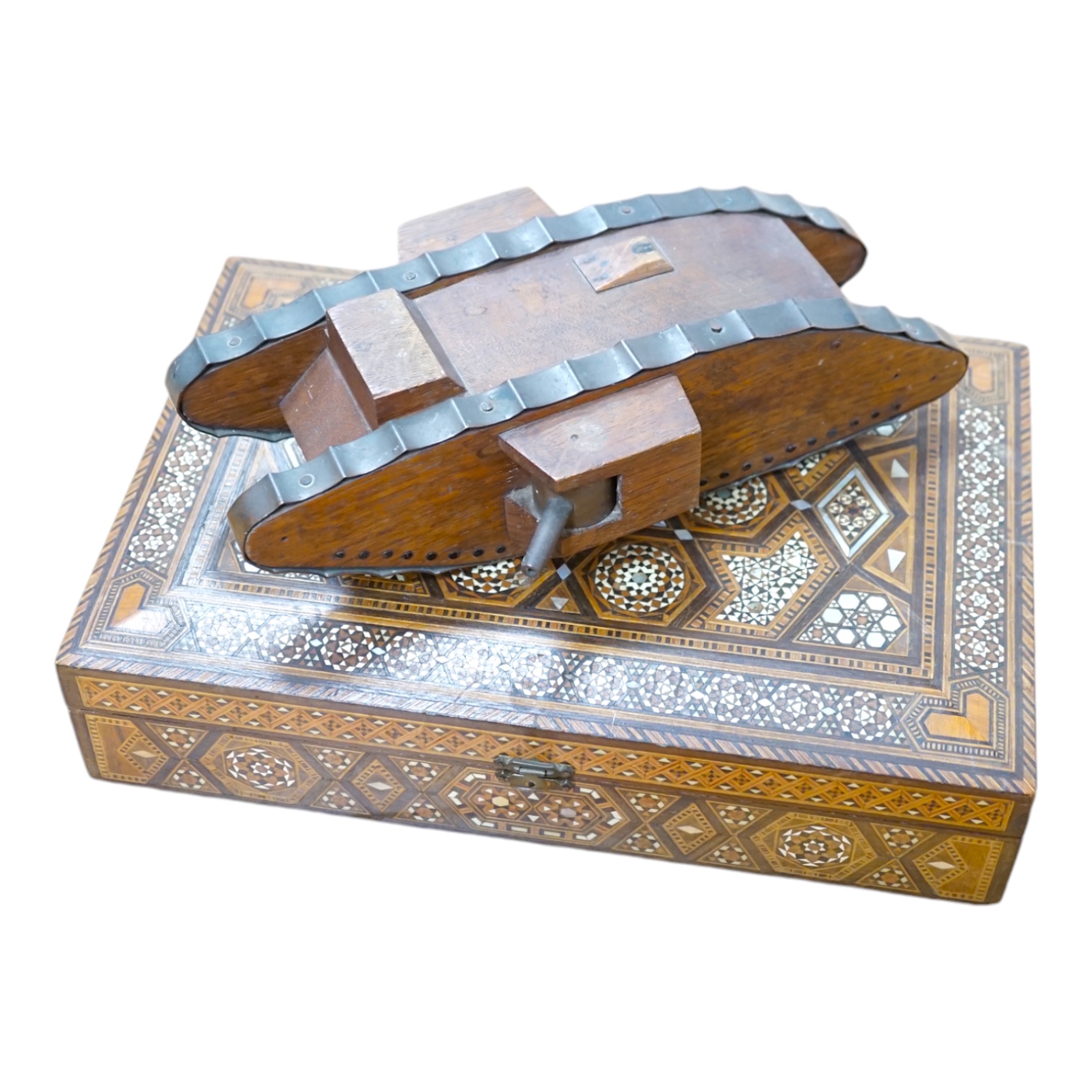 A Trench art tank, a parquetry box including paste and silver brooch and mixed collectables, box 30cm x 20cm. Condition - tank, box and brooch good, other contents variable